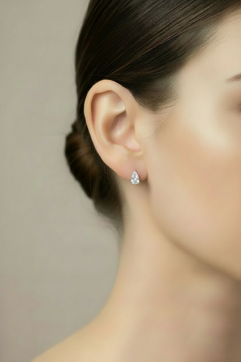 Gold Pear-Shaped Stud Earrings